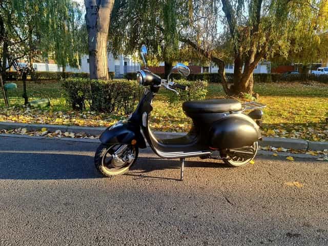 Vand/Schimb/Rate Scuter electric Retro