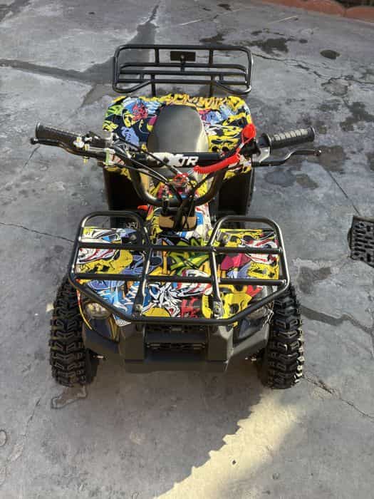 Vând atv de copii ca nou