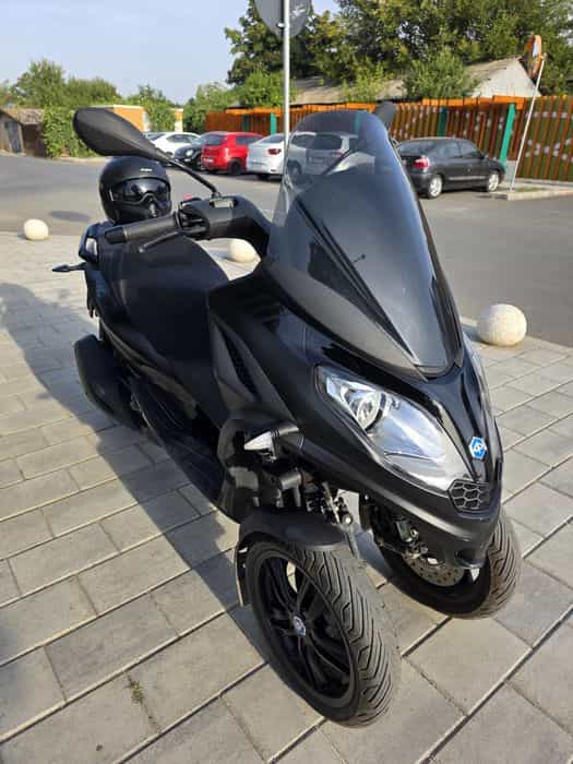 Scuter Piaggio MP3 se conduce cu categoria B ca nou impecabil