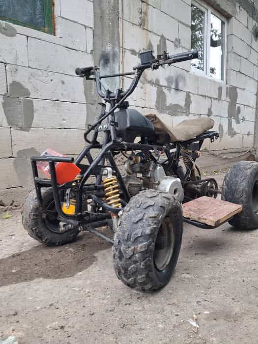 Vând atv 125 cc  funcționează