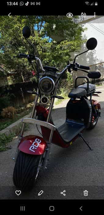 Scuter electric inscris