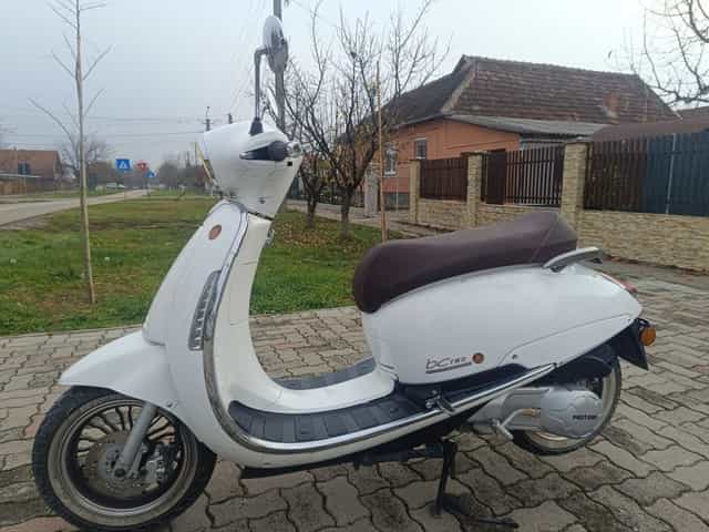 Scuter 125cc     .
