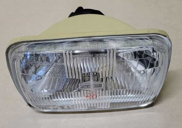 lampa przód reflektor h4 koito mazda jeep toyota hiace celica 4 runner nowa