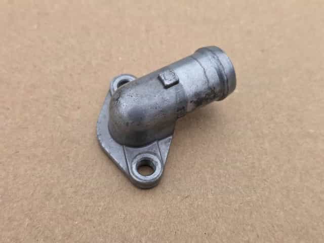 Kruciec kolanko wody głowicy układu chłodzenia Honda CRF 450 r. 09-16