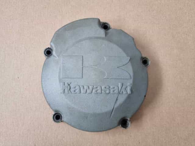 Pokrywa dekiel statora magneta Kawasaki KX 125 r. 88-91 OEM