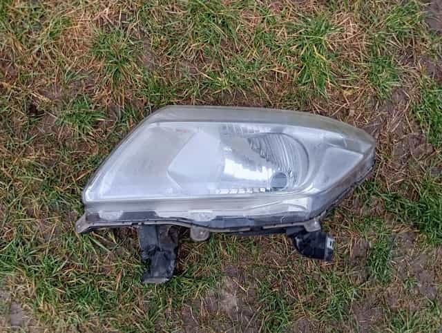 Lampa reflektor lewy przód Nissan Navara Oryginał Europa