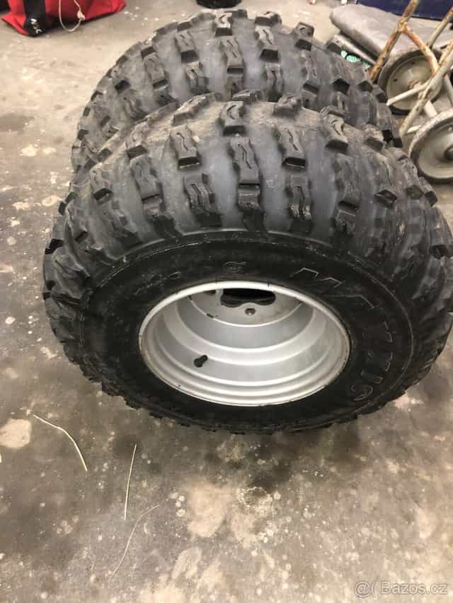 pneu s rafky 22x10-10 4x110  2ks