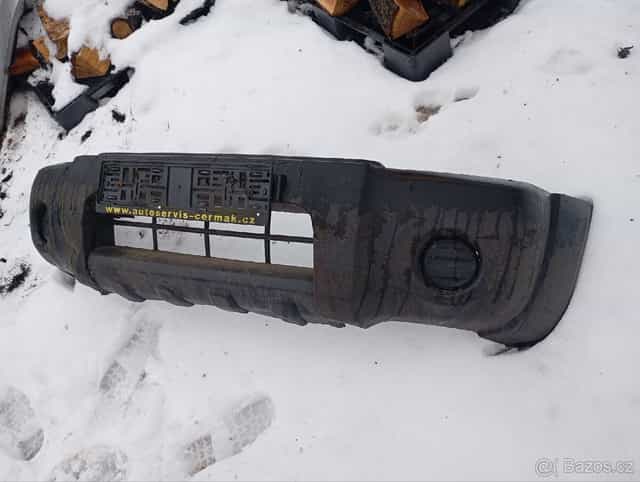 Přední nárazník Nissan Navara D22