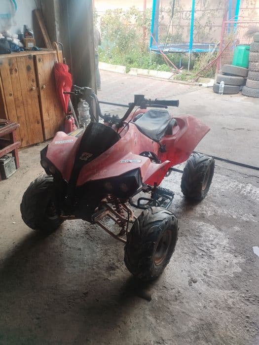 Vând sau schimb ATV kxd 110cc semi automat 1200 lei (schimb cu un alt