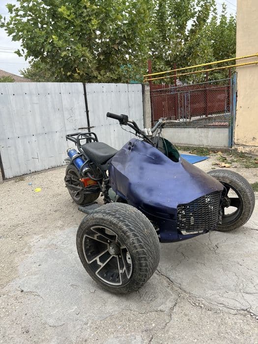 Vand sau schimb atv cu 3 rotii