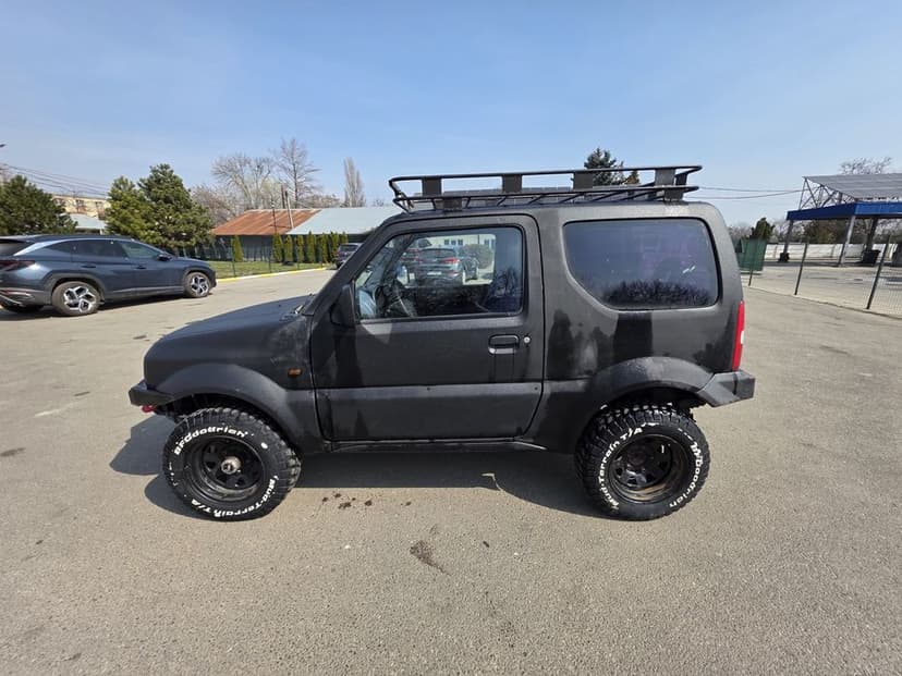 Suzuki jimny 1.3 cu AC an 2003