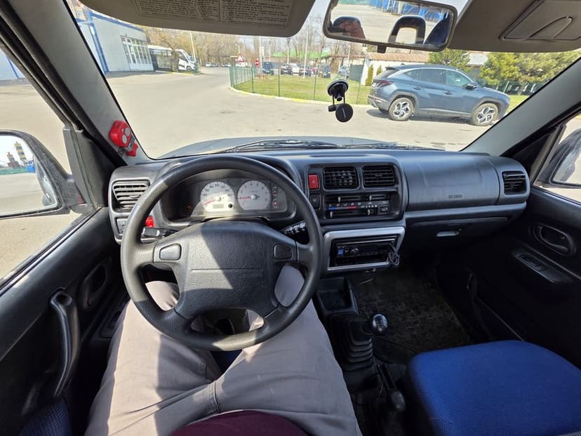 Suzuki jimny 1.3 cu AC an 2003