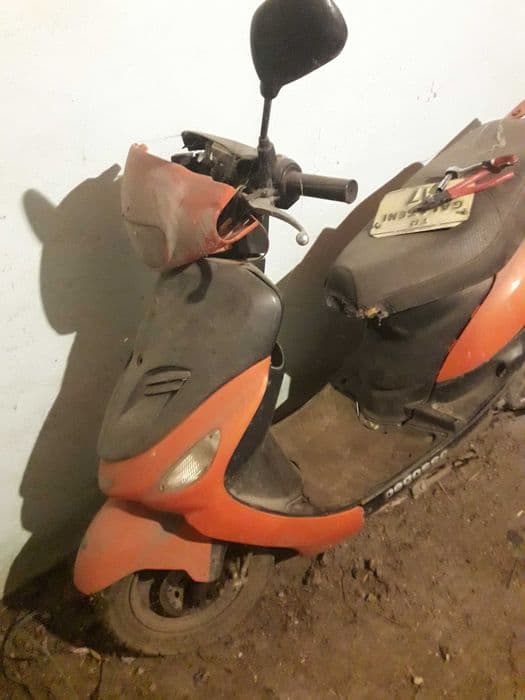 Scuter în patru timpi