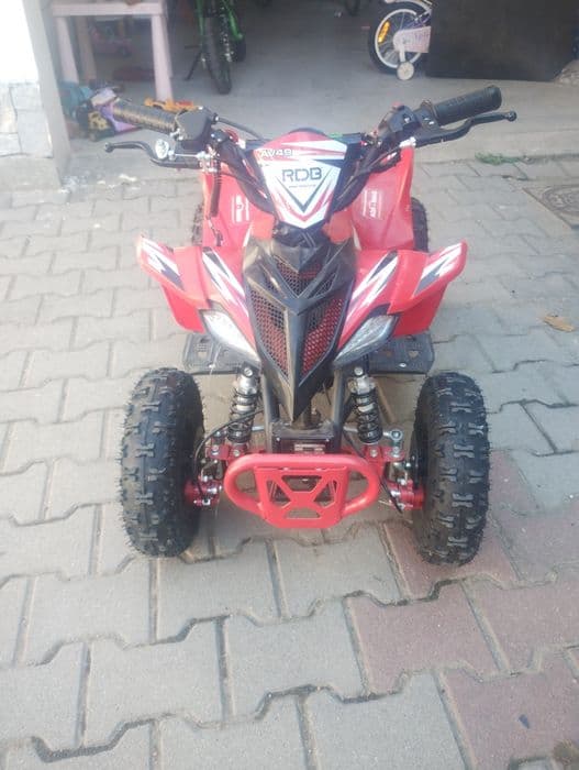 Vând ATV copii aproape nou
