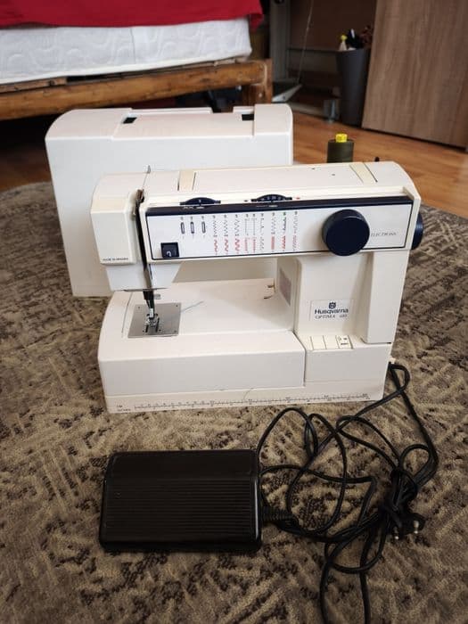 Mașina de cusut Husqvarna