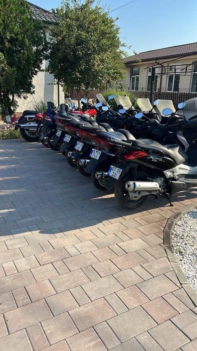 Motociclete, scutere și piese de schimb