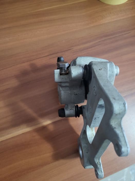 Etrier frana spate KTM Brembo, conducta frana spate, plăcute frana.