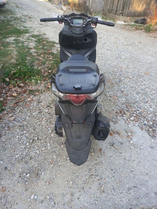 Vind scuter sym 125 cm