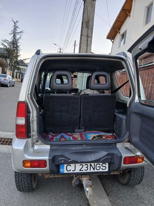 Suzuki Jimny, motorina, 4x4 cu reductor, suspensii Old Man EMU