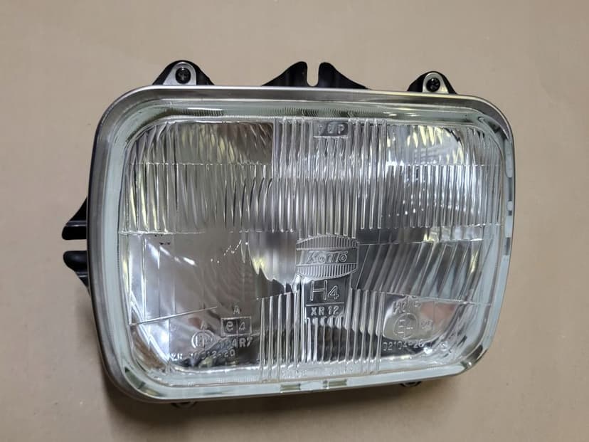 lampa przód reflektor h4 koito ramka chrom mazda jeep toyota hiace celica