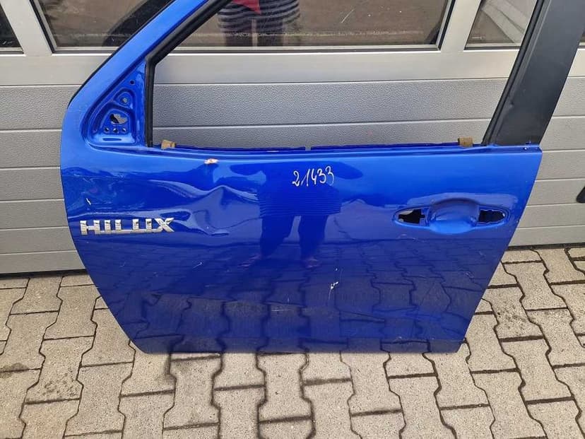 Toyota Hilux 15 r.- Drzwi Przód Lewe