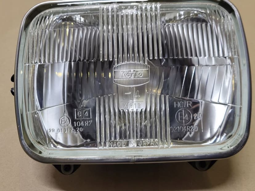 lampa przód reflektor h4 koito ramka chrom mazda jeep toyota hiace celica