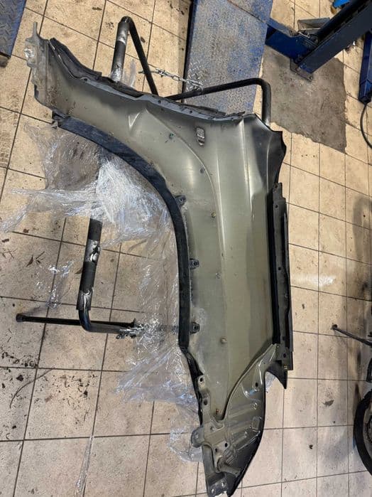 Błotnik Lewy Toyota Land Cruiser 120