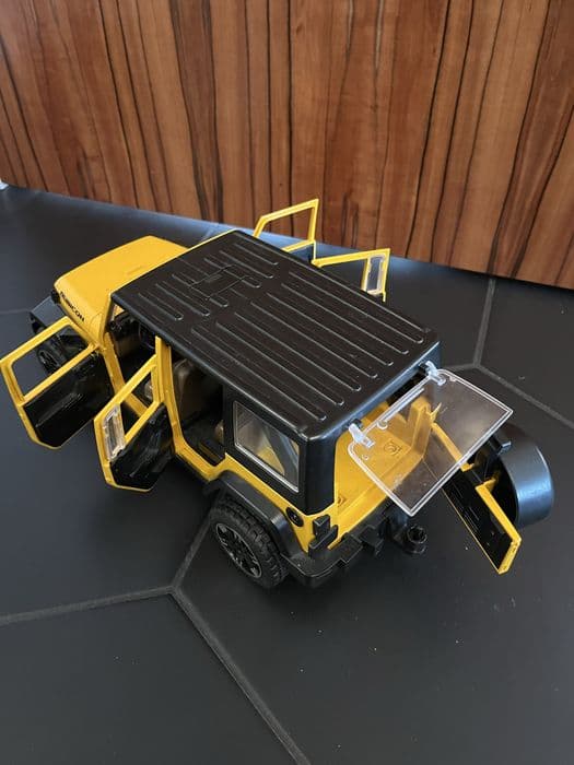 Bruder jeep wrangler rubicon żółty