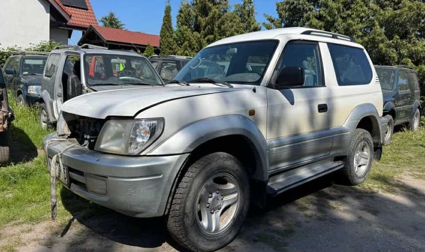 Toyota Land Cruiser J90 / J95 podłokietnik  +inne części.