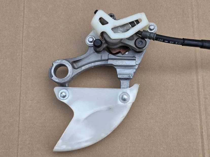 Tył tylny zacisk hamulcowy Kawasaki KX KXF 250 / 450 OEM ! + przewód