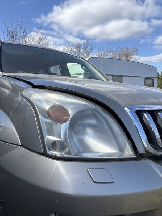 Toyota land cruiser j120 lampa zderzak maska drzwi lusterko klapa koła