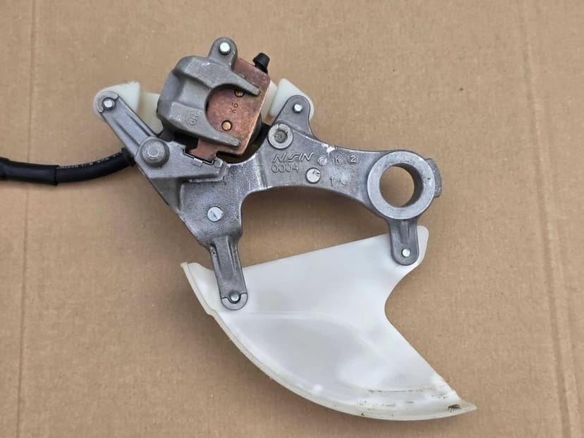 Tył tylny zacisk hamulcowy Kawasaki KX KXF 250 / 450 OEM ! + przewód