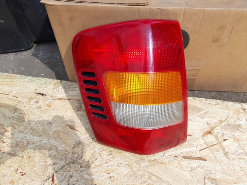 Lampa lewa Jeep Grand Cherokee WJ oryginał