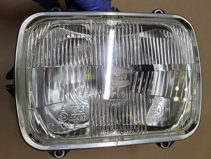 lampa przód reflektor h4 koito ramka chrom mazda jeep toyota hiace celica