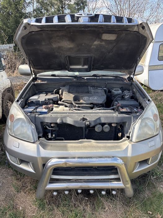 Toyota land cruiser j120 lampa zderzak maska drzwi lusterko klapa koła