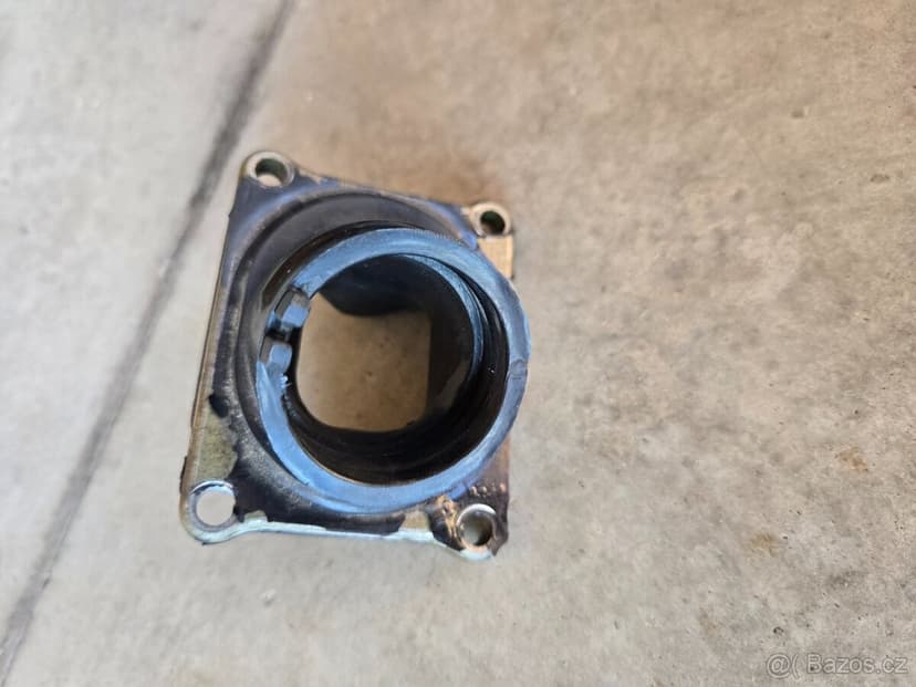 Přiruba 38mm Husqvarna 125