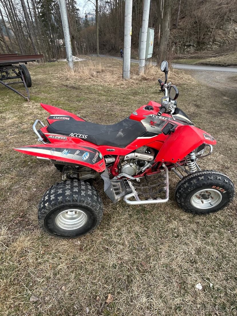 Prodám Access Warrior 450 + sada silničních pneu
