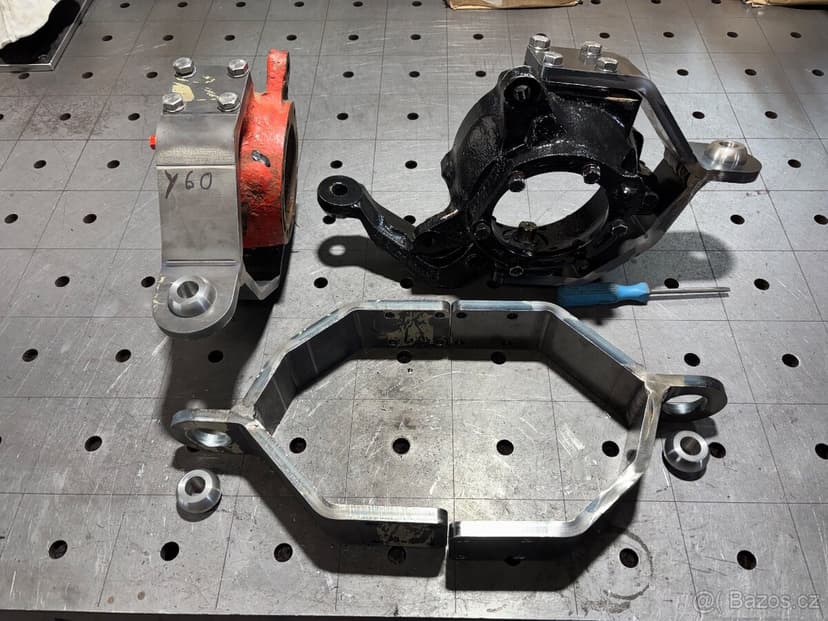 Príruba na osadenie hydroriadenia na nápravu Nissan Patrol