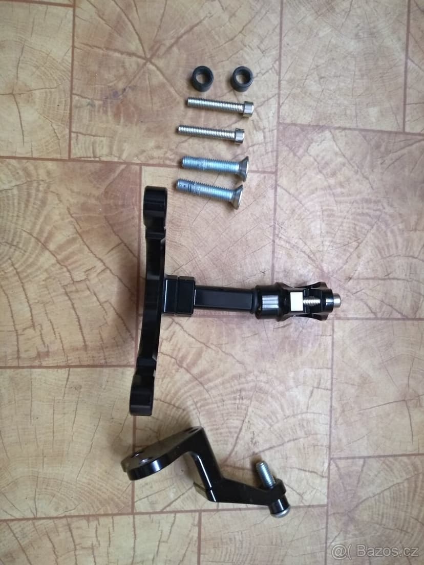 Tlumič řízení s montážní sadou