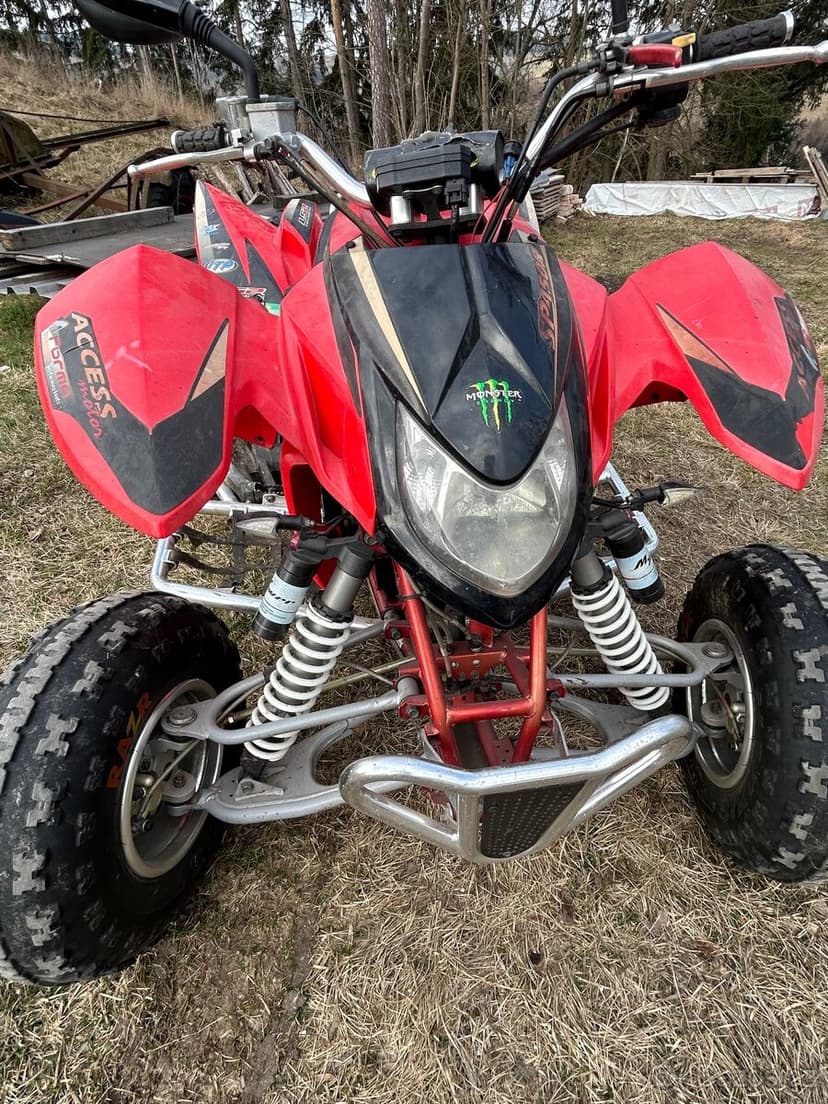 Prodám Access Warrior 450 + sada silničních pneu