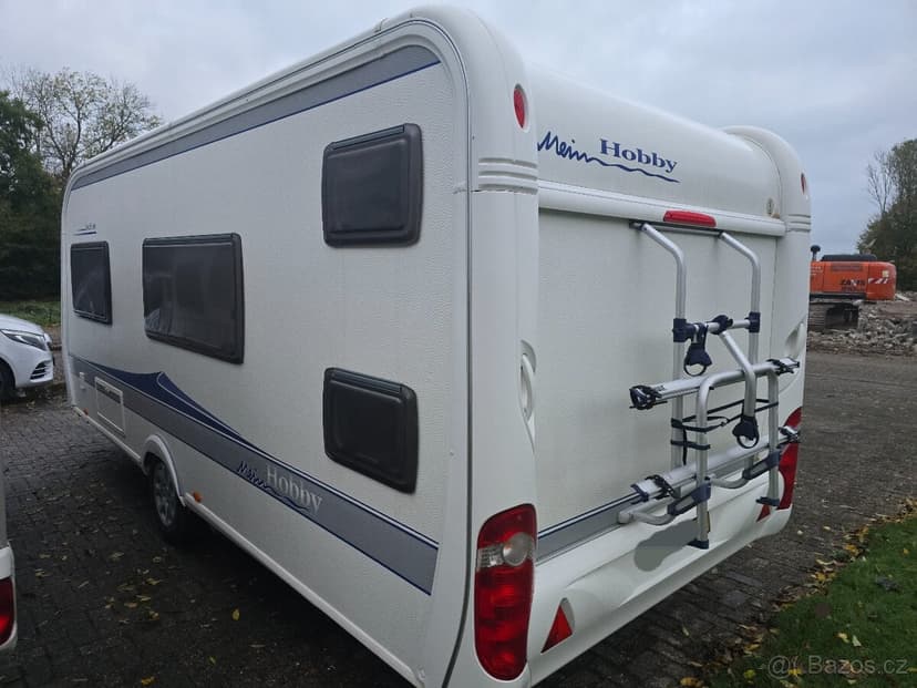 Prodám karavan Hobby 500 kmfe,r.v.2010 + mover + markýza