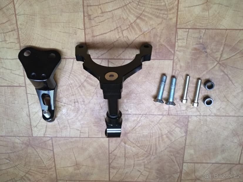 Tlumič řízení s montážní sadou