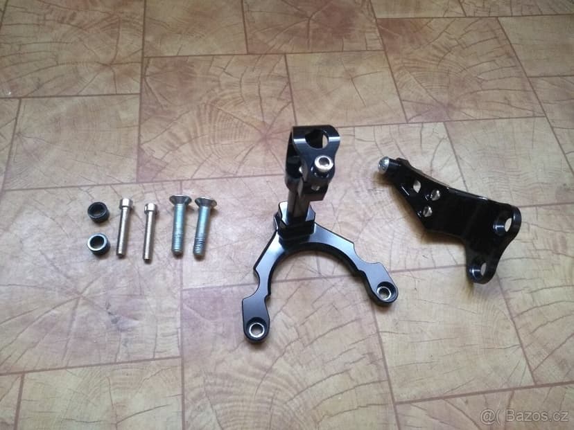 Tlumič řízení s montážní sadou