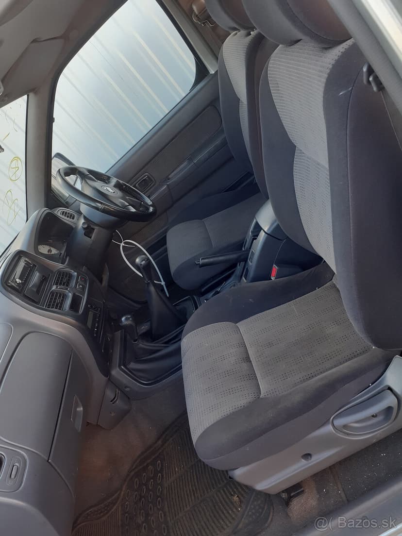 Nissan Navara D22 2.5TD 100kW stříbrná ND