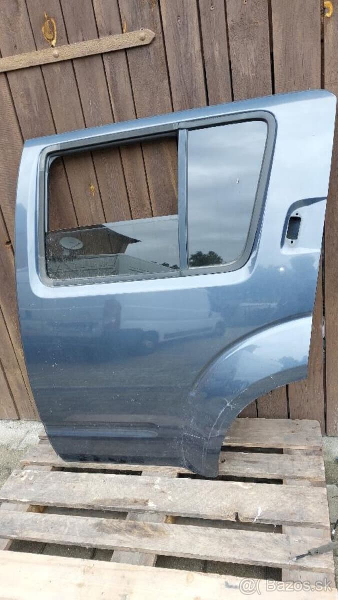 Dveře,zámek,stahovačka Nissan Navara D40/Pathfinder R51