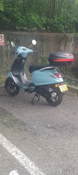 Vând scuter aproape nou