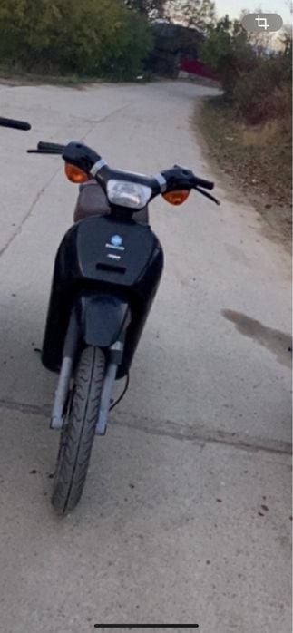 Dau la schimb piaggio free + un volan de gaming pe un cross functional