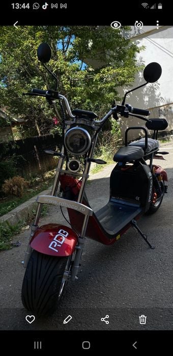 Scuter electric inscris