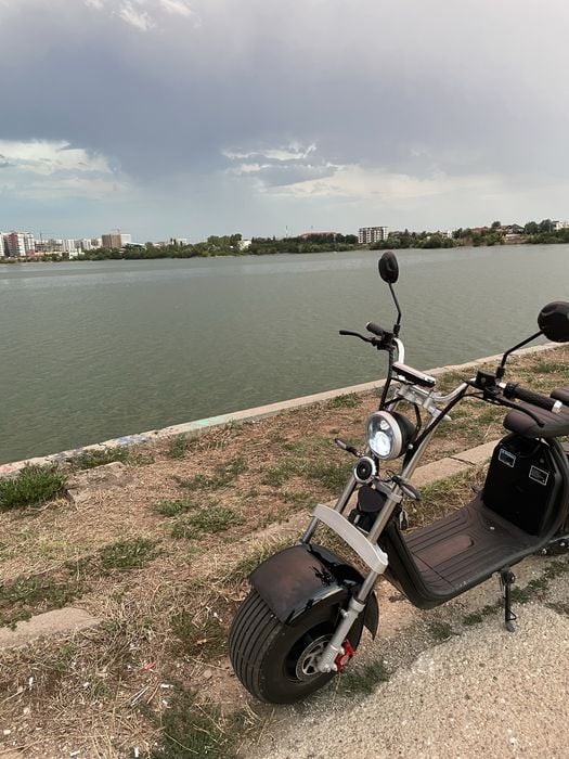 Scuter electri city coc