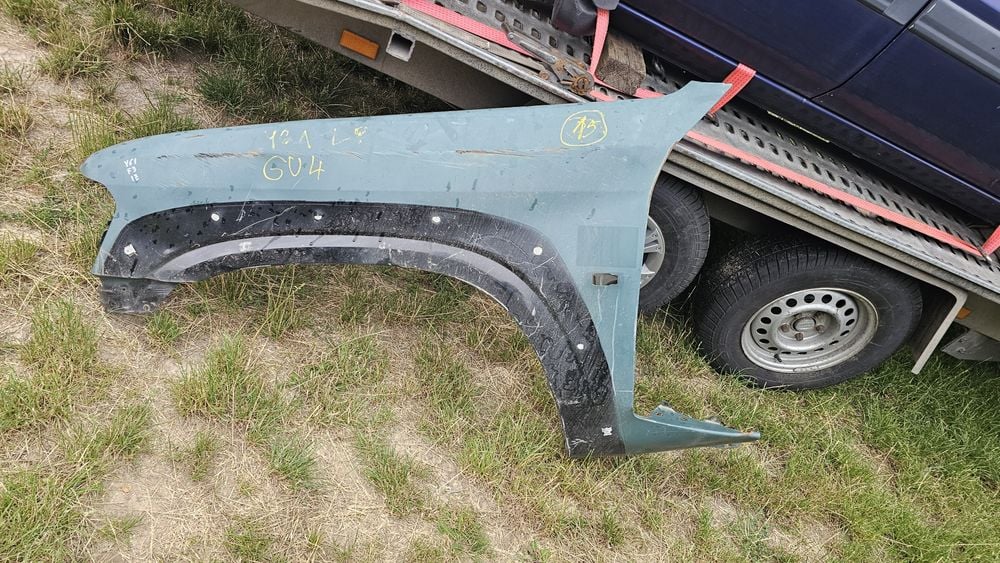 Nissan Patrol y61 GU4 błotnik lewy przód